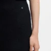 Stickad kjol med logotypberlock