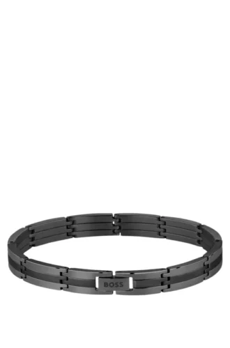Svart randigt armband i rostfritt stål med logolås