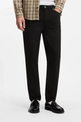 Svarta jeans med avsmalnande passform i stretchdenim