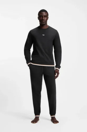 Sweatshirt i bomullsfrotté med logotyp och signaturränder