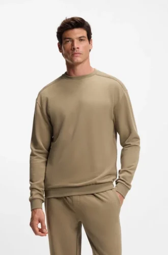 Sweatshirt med logotyp på axeln i bomullsfrotté