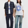 T-shirt för alla kön med suddat logo