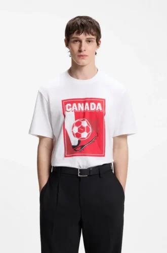 T-shirt i bomull med fotbollsmotiv och avslappnad passform