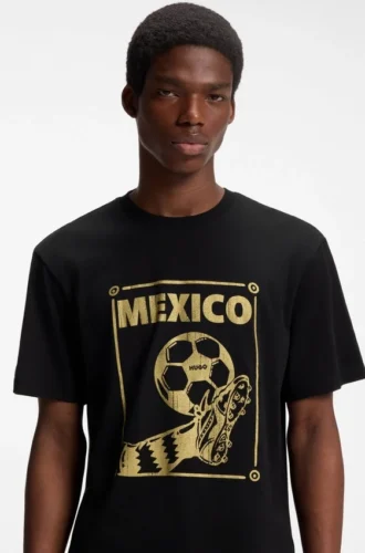 T-shirt i bomull med fotbollsmotiv och avslappnad passform