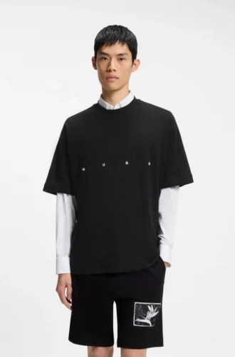 T-shirt i bomull med oversize-passform och iögonfallande tryckt logotyp