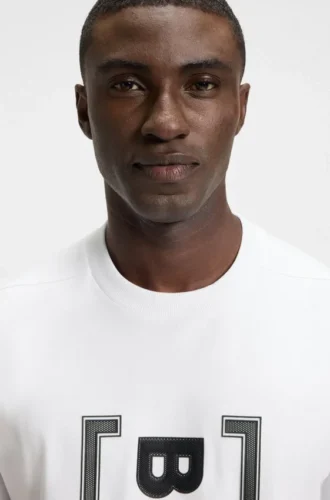 T-shirt i interlock-bomull med tryck i mesh