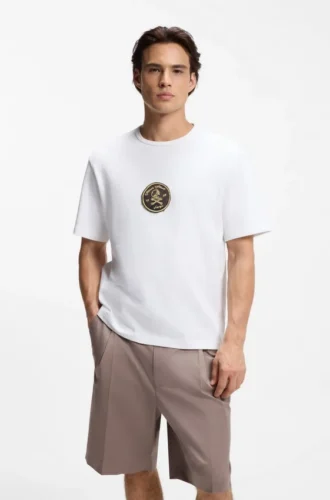 T-shirt med broderad emblem i bomullsfrotté