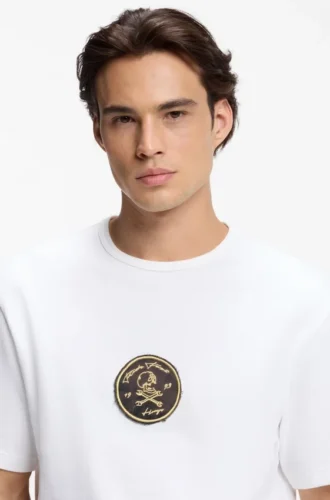 T-shirt med broderad emblem i bomullsfrotté