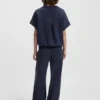 T-shirt med handskriven logotyp i oversized-passform