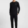 Tofflor i mikrofiber med fluffigt foder