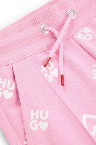Träningsbyxor för barn i bomullsblandning med logotyper och hjärtan