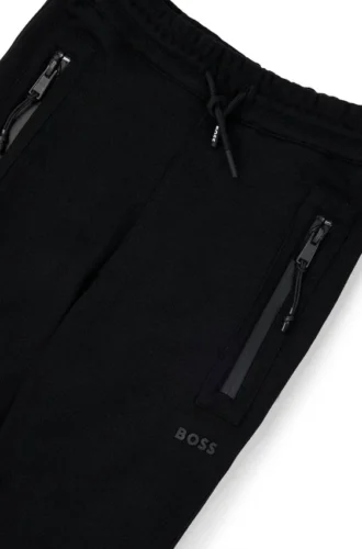 Träningsbyxor för barn i stretchpiqué med logodetalj
