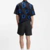 Vattenavvisande shorts med flagglogotyp