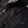 Vindjacka med huva för barn med monogrammönster