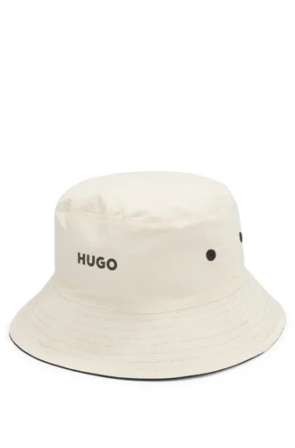 Vändbar bucket hat för barn i ripstop och bomull