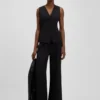 Väst i oversized-passform i stretchkrep Väst i oversized-passform i stretchkrep